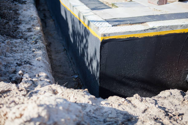 Professional Emergency Waterproofing technician working in Baxter, TN